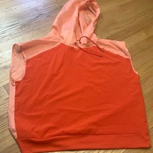 Thin windbreaker jacket. Pink/peach/red color. Size small. Never worn.